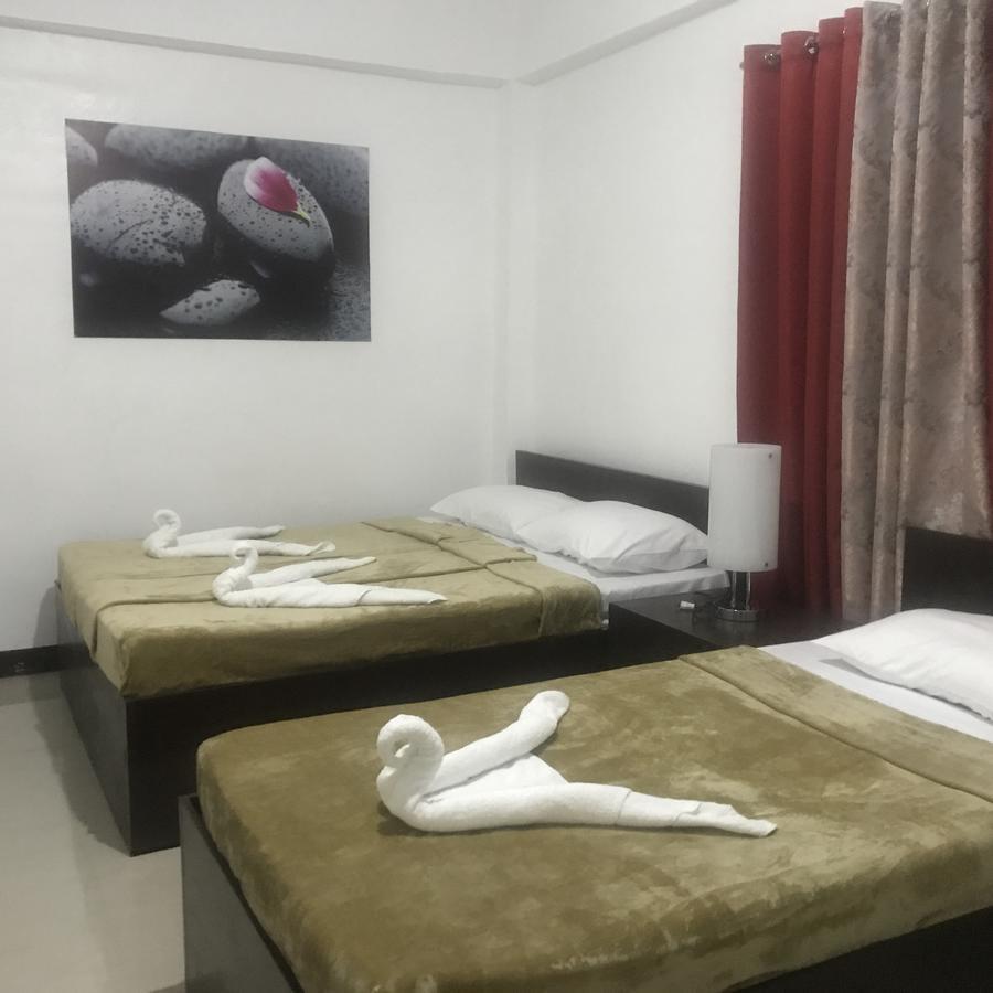 4C'S Tourist Lodge Puerto Princesa Εξωτερικό φωτογραφία