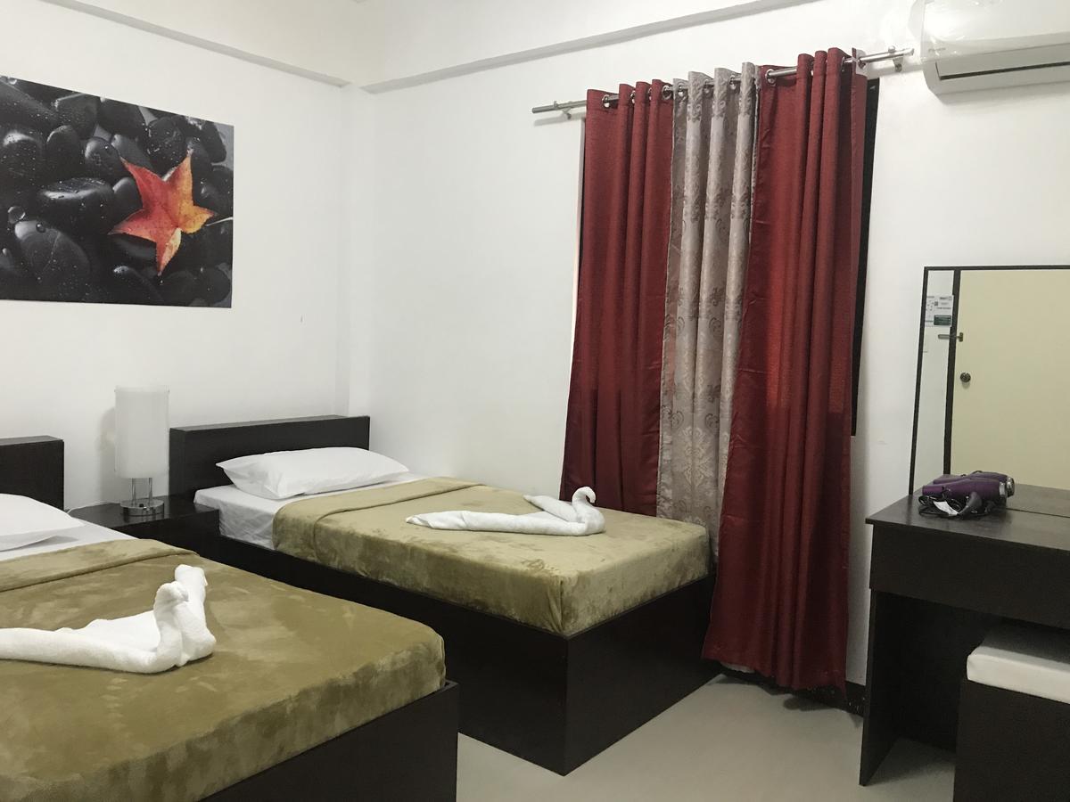 4C'S Tourist Lodge Puerto Princesa Εξωτερικό φωτογραφία