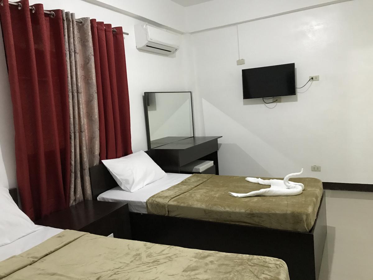 4C'S Tourist Lodge Puerto Princesa Εξωτερικό φωτογραφία